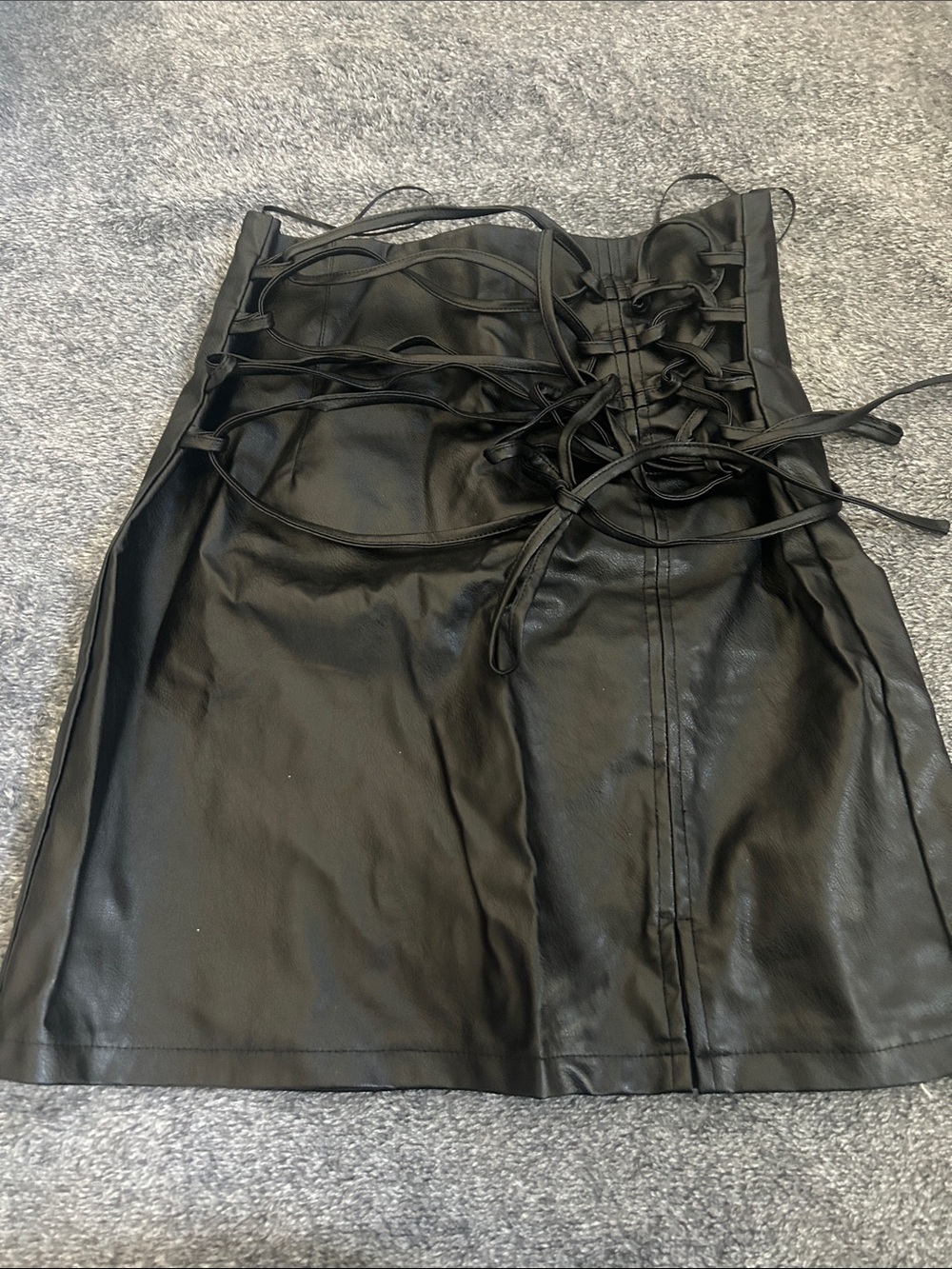 High-Waist Black Faux Leather Mini Skirt with Lace-Up Detail